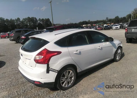 2012 Ford Focus Sel z USA, uszkodzony, nr VIN 1FAHP3M23CL404012